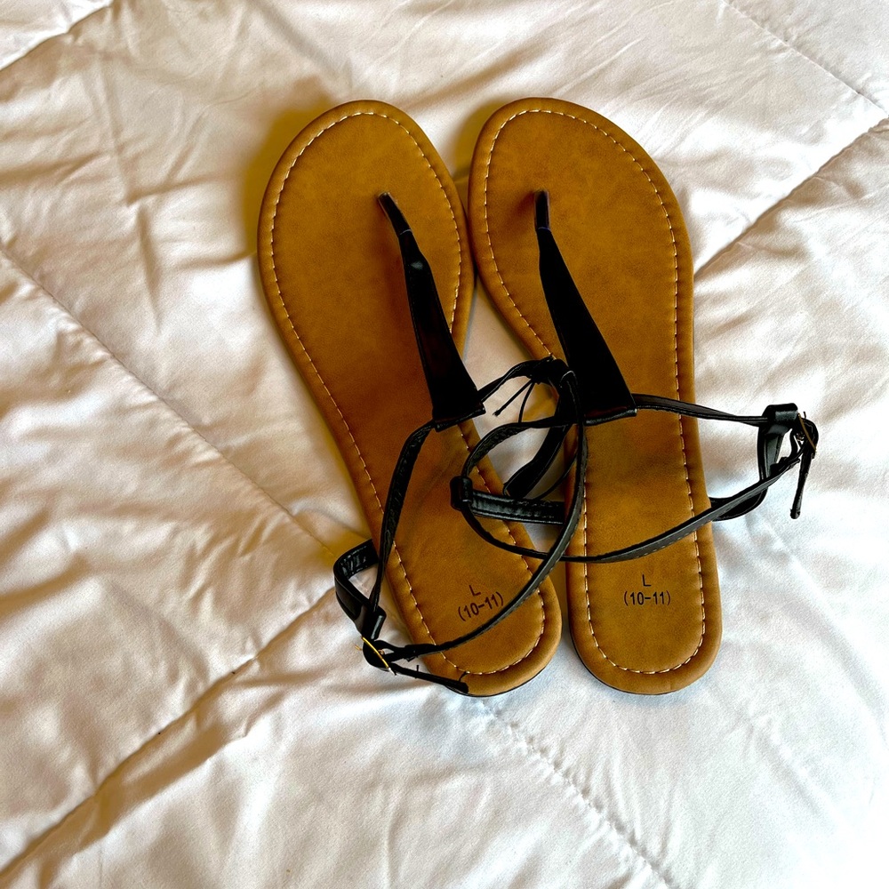 Ladies, black sandals.